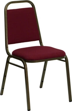 HERCULES Series Trapezoidal Back Stacking Banquet Chair In Burgundy Fabric - Gold Vein Frame - By Flash Furniture - Madison Seating