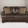 Signature Design By Ashley Axiom Walnut Loveseat - Madison Seating